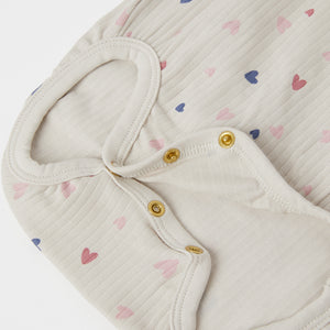 Organic Cotton Heart Print Babygrow from the Polarn O. Pyret baby collection. Nordic baby clothes made from sustainable sources.