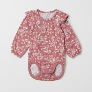 Organic Cotton Pink Floral Babygrow from the Polarn O. Pyret baby collection. Nordic baby clothes made from sustainable sources.