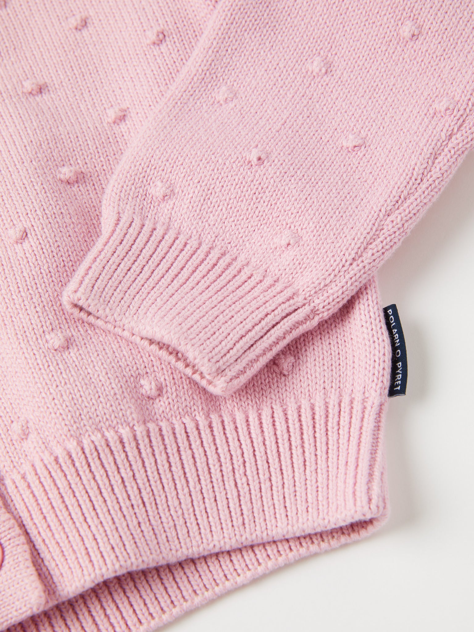 Pink Kids Knitted Cardigan from the Polarn O. Pyret kidswear collection. Clothes made using sustainably sourced materials.