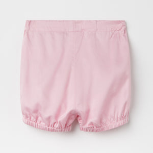 Pretty Pink Cotton Baby Shorts from the Polarn O. Pyret baby collection. Clothes made using sustainably sourced materials.