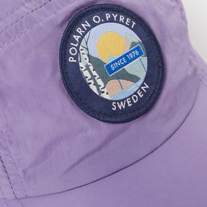 Kids Shell Cap from the Polarn O. Pyret kidswear collection. Quality kids clothing made to last.