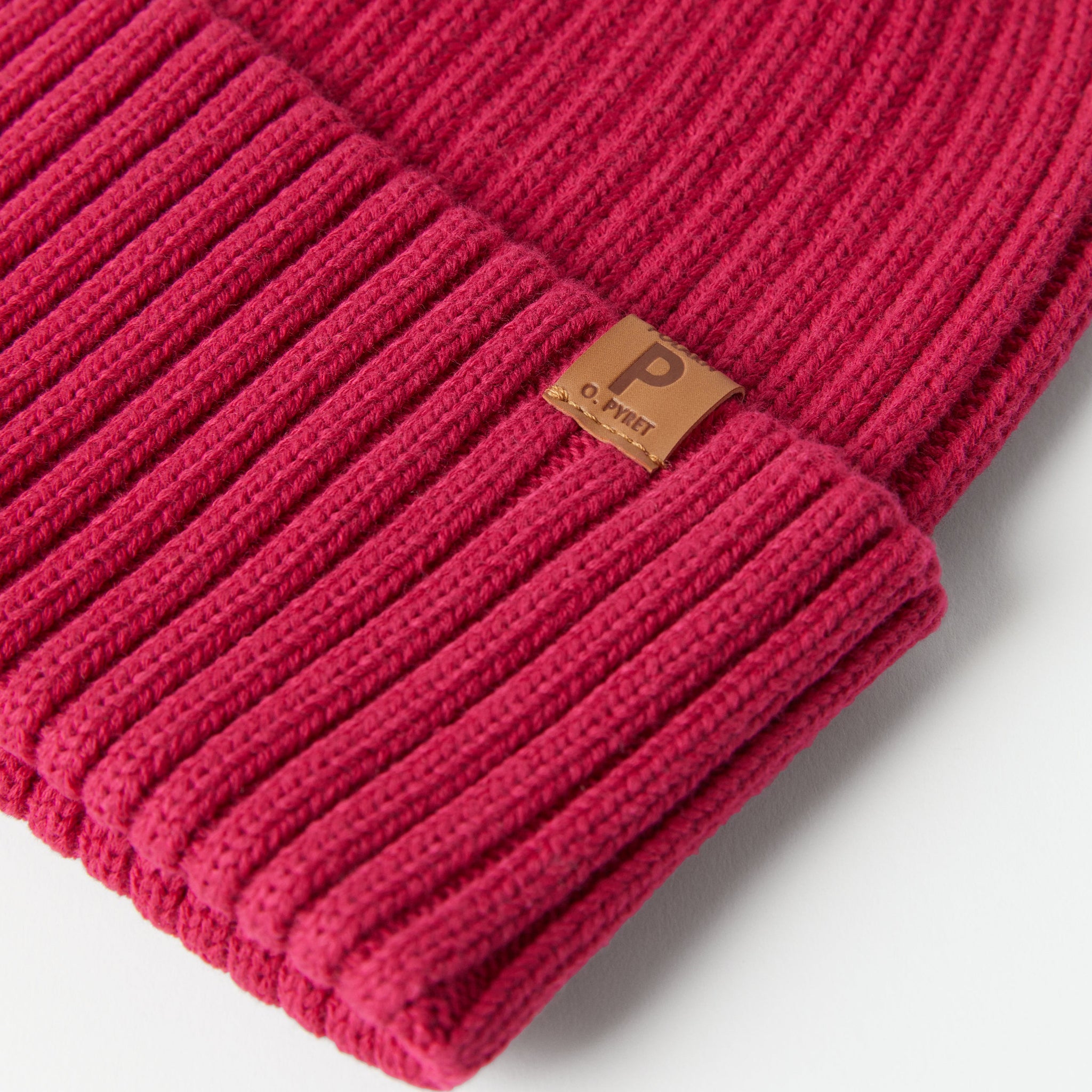 Red Kids Knitted Hat from the Polarn O. Pyret kidswear collection. The best ethical kids outerwear.
