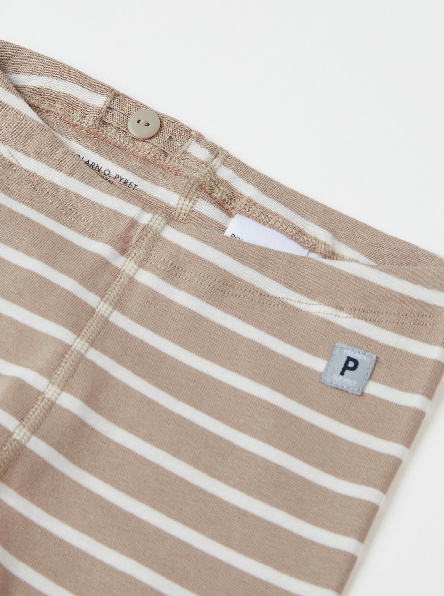 Organic Cotton Beige Baby Leggings from the Polarn O. Pyret babywear collection. Nordic kids clothes made from sustainable sources.