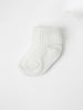 Organic Cotton White Baby Socks from the Polarn O. Pyret babywear collection. Ethically produced kids clothing.