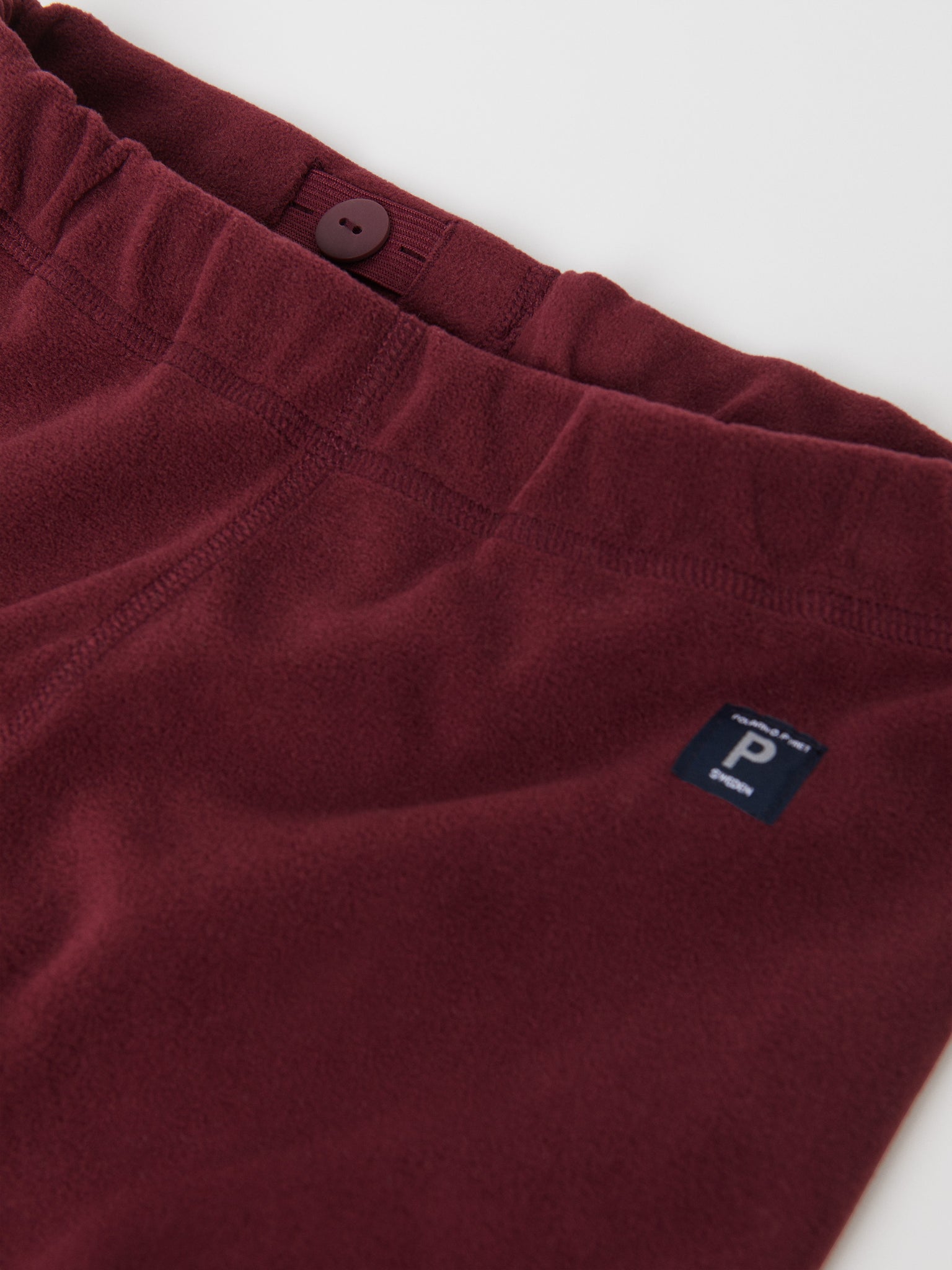 Burgundy Fleece Kids Thermal Trousers from the Polarn O. Pyret outerwear collection. Ethically produced kids outerwear.
