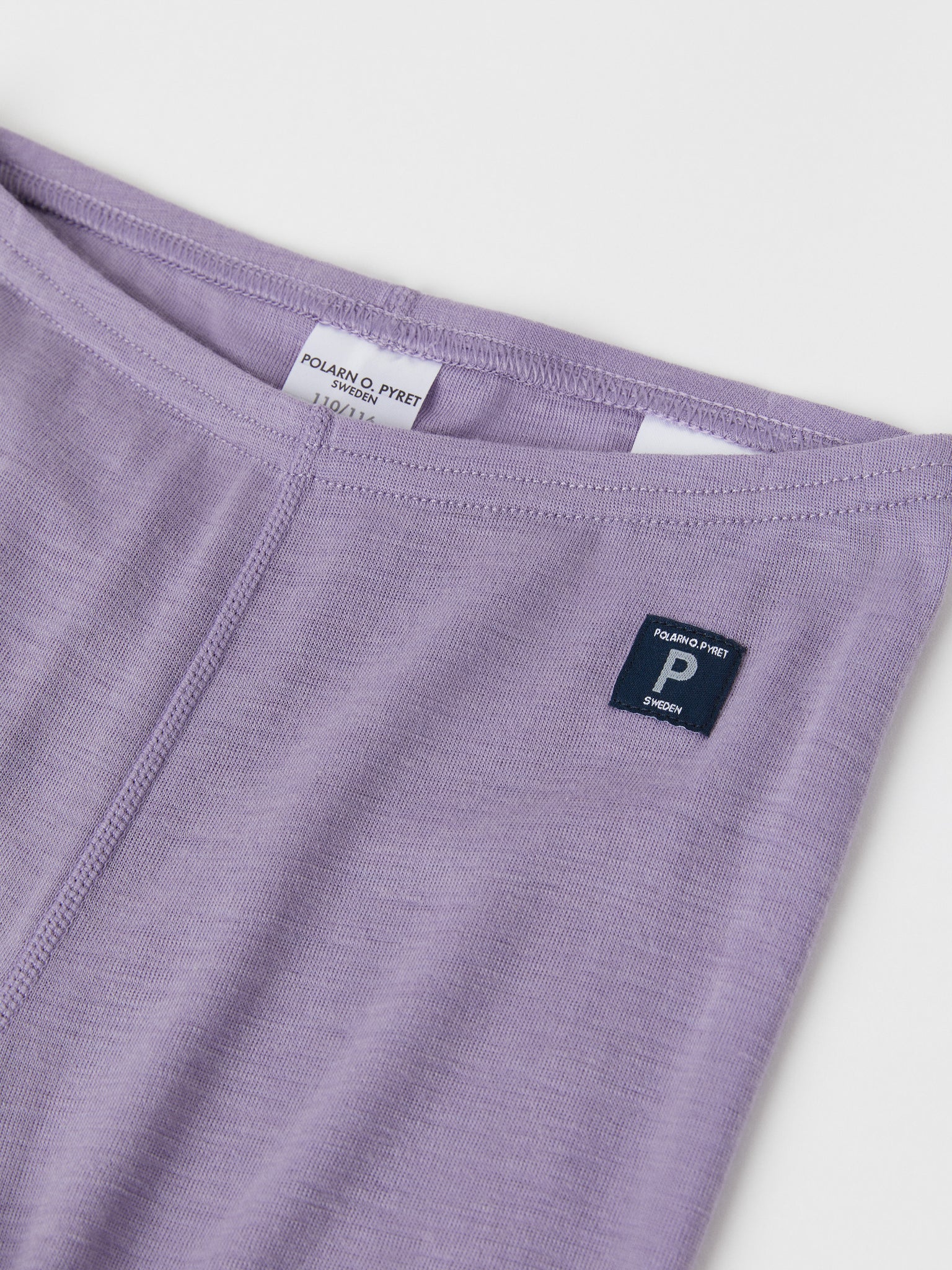 Purple Merino Kids Thermal Leggings from the Polarn O. Pyret outerwear collection. Quality kids clothing made to last.