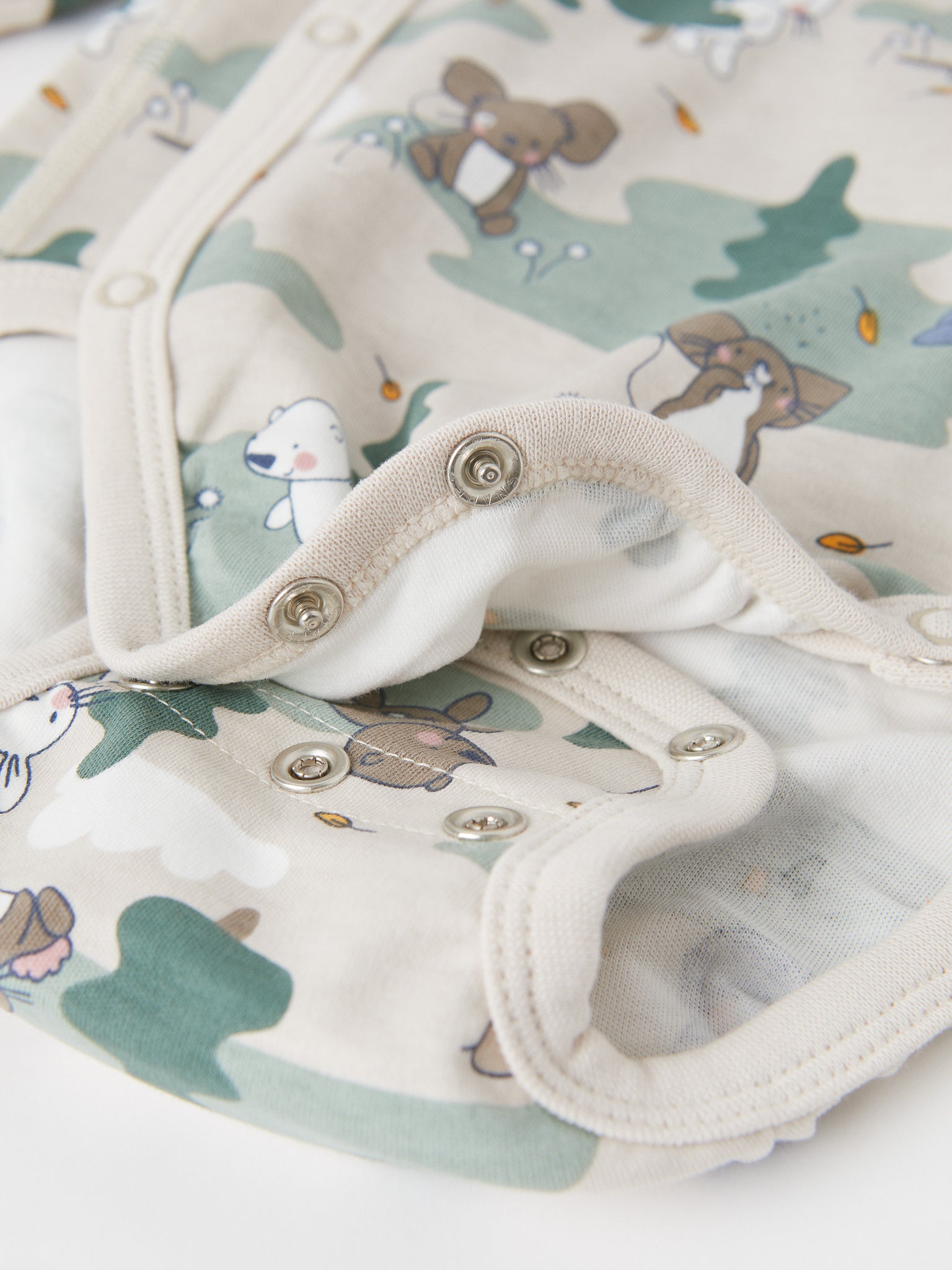 Organic Cotton Wraparound Babygrow from the Polarn O. Pyret baby collection. Ethically produced baby clothing.