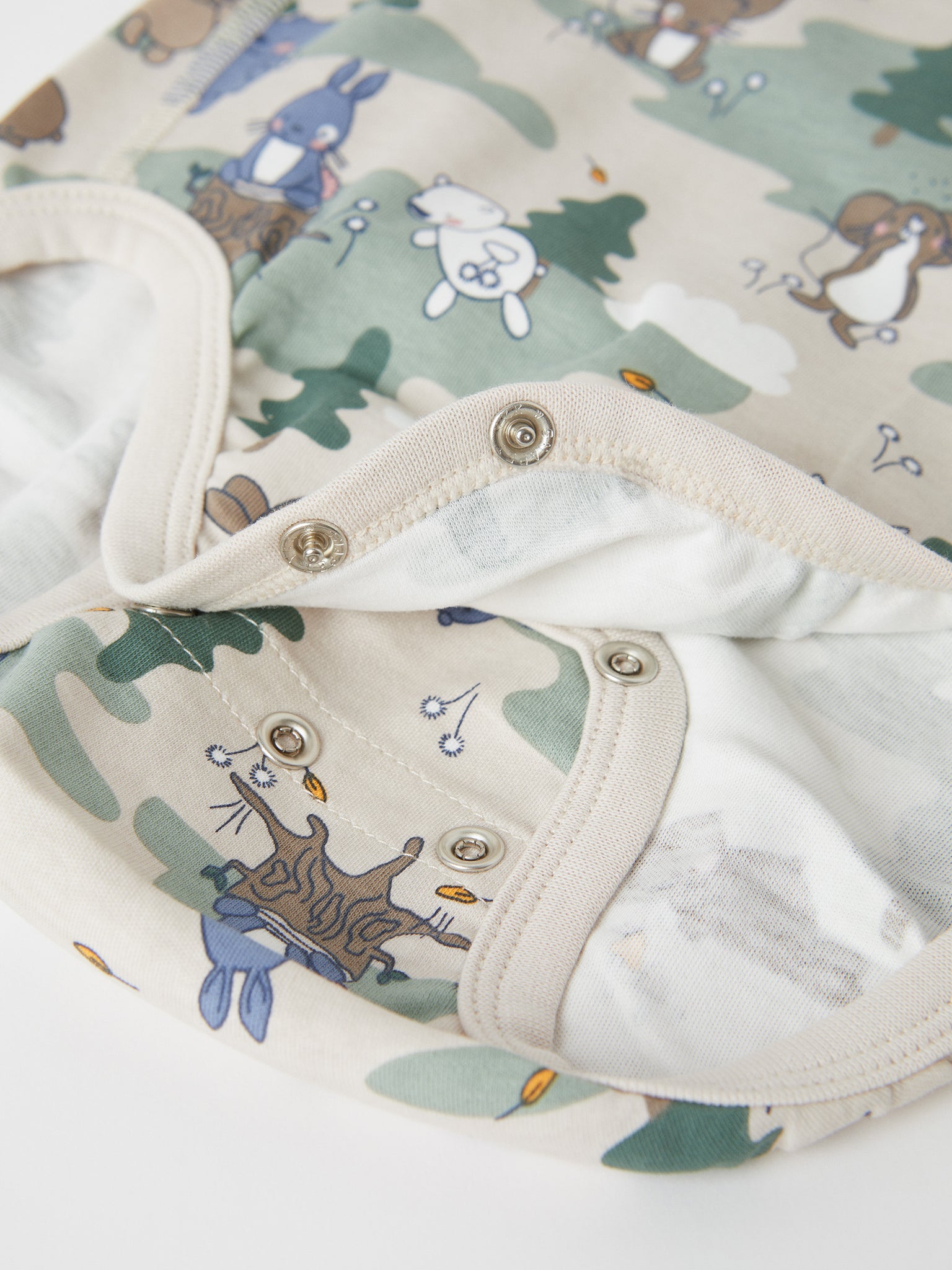 Forest Print Organic Cotton Babygrow from the Polarn O. Pyret baby collection. Clothes made using sustainably sourced materials.