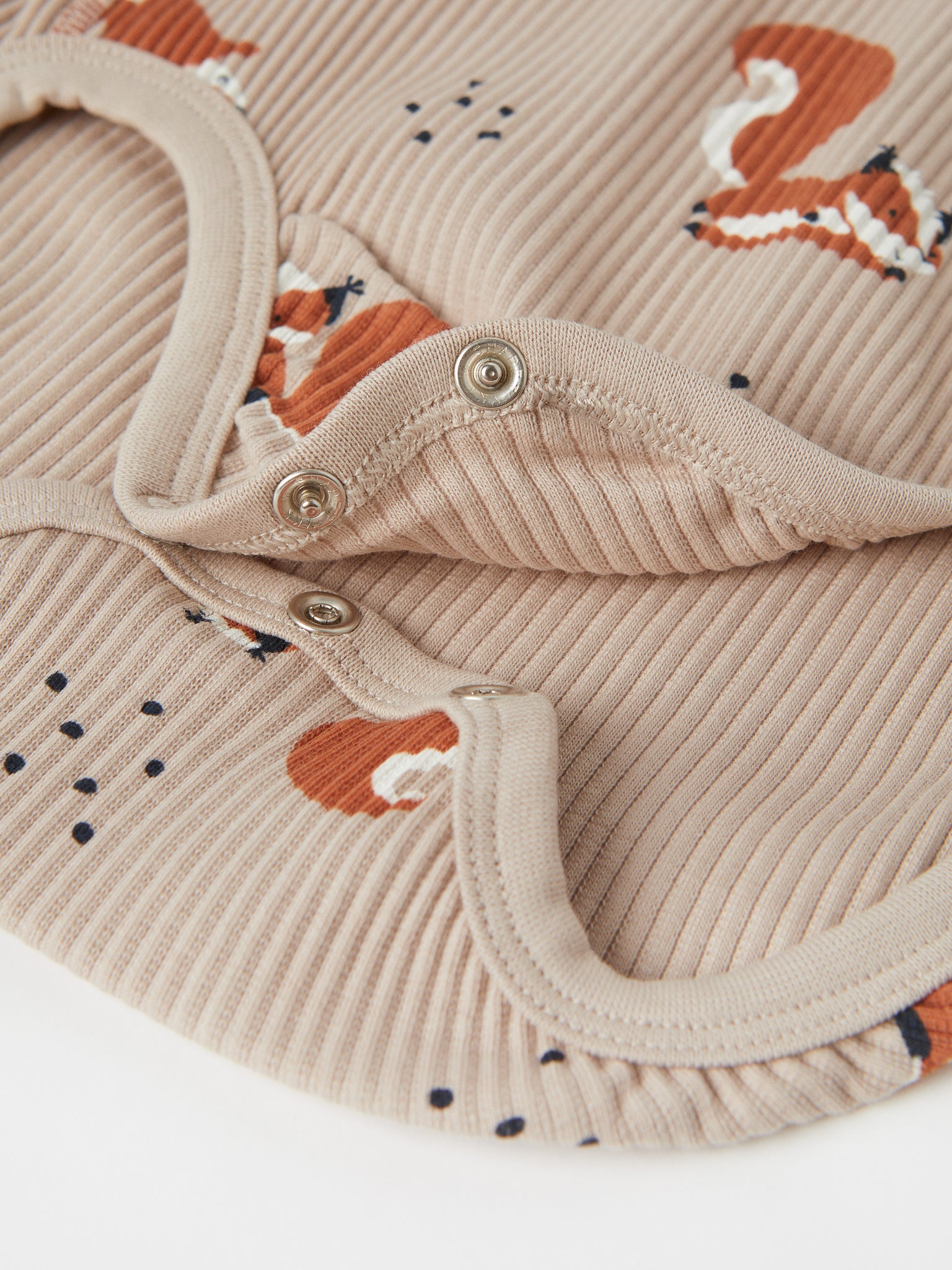 Squirrel Print Organic Cotton Babygrow from the Polarn O. Pyret baby collection. Nordic baby clothes made from sustainable sources.