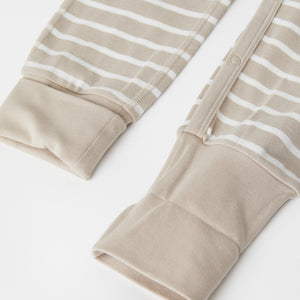 Organic Cotton Beige Baby Sleepsuit from the Polarn O. Pyret baby collection. Made using 100% GOTS Organic Cotton
