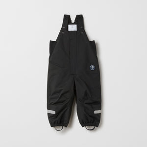 Kids Black Waterproof Salopettes from the Polarn O. Pyret outerwear collection. Made using ethically sourced materials.