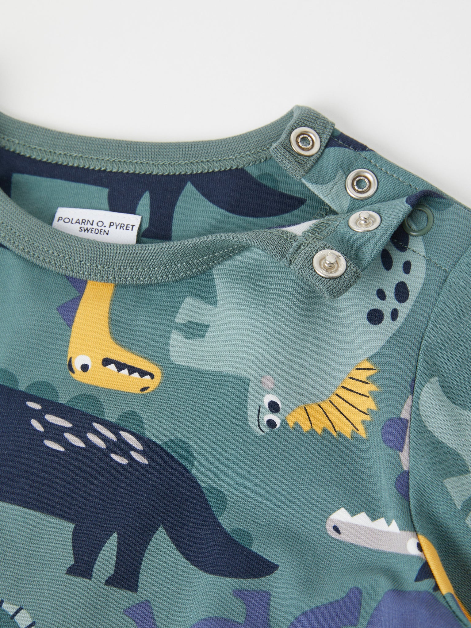 Green Dinosaur Print Kids Top from the Polarn O. Pyret kidswear collection. Ethically produced kids clothing.
