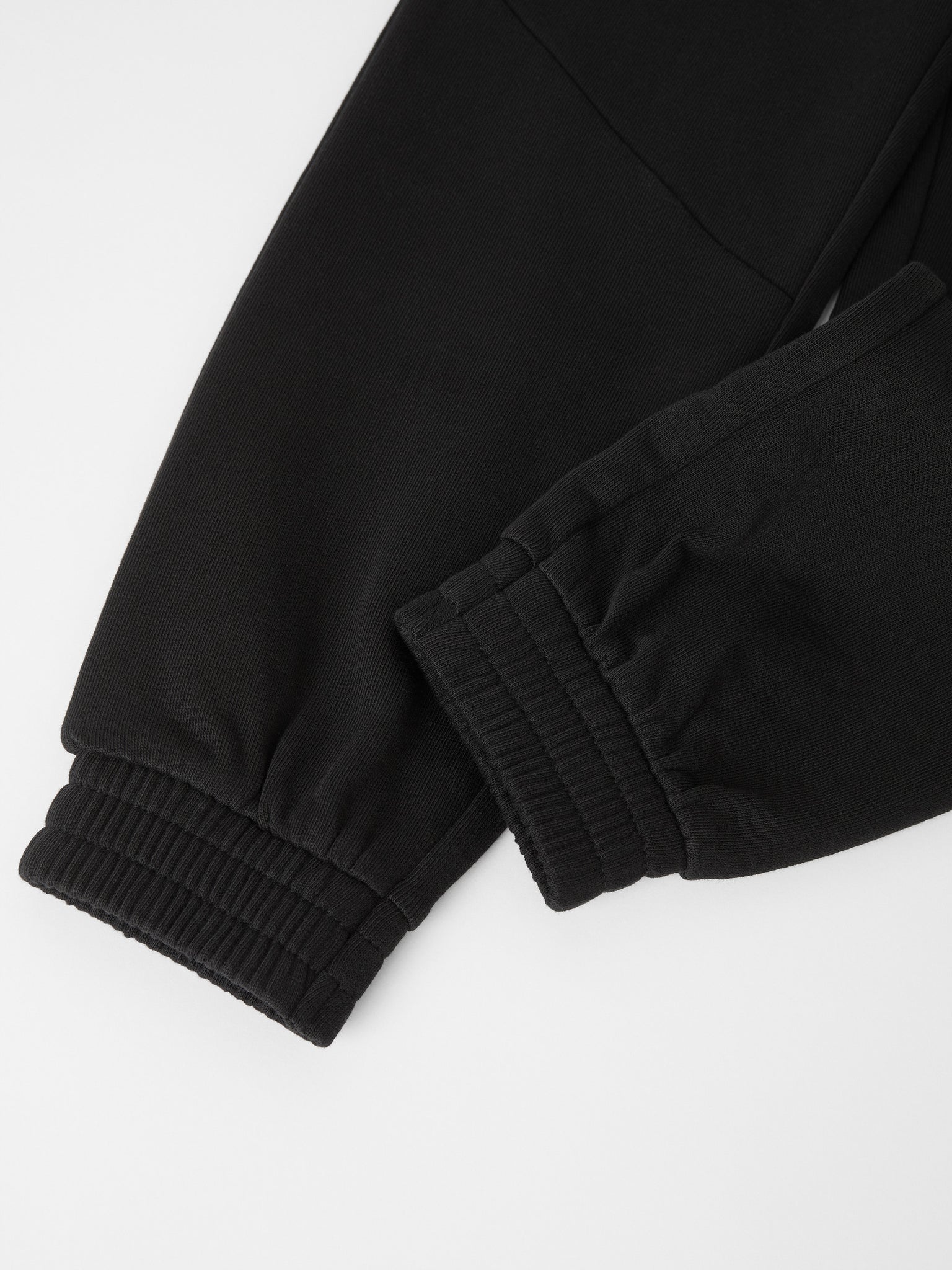 Organic Cotton Kids Black Joggers from the Polarn O. Pyret kids collection. Made using 100% GOTS Organic Cotton