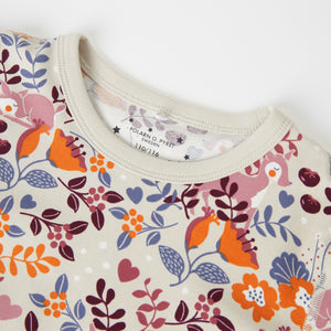 Floral Print Kids Beige Pyjamas from the Polarn O. Pyret kids collection. Nordic kids clothes made from sustainable sources.