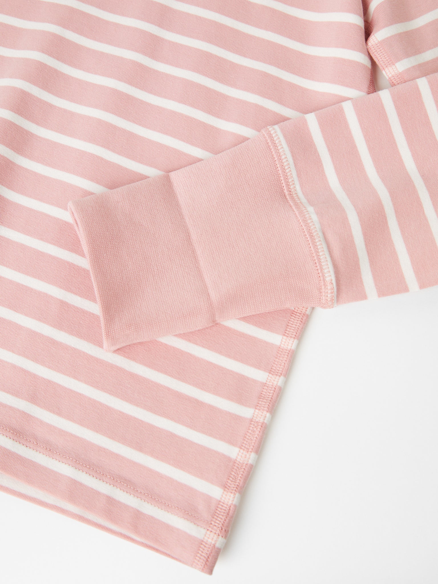 Organic Cotton Kids Pink Pyjamas from the Polarn O. Pyret kids collection. Clothes made using sustainably sourced materials.