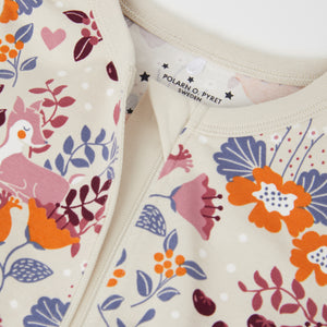Floral Print Pink Baby Sleepsuit from the Polarn O. Pyret baby collection. Nordic baby clothes made from sustainable sources.