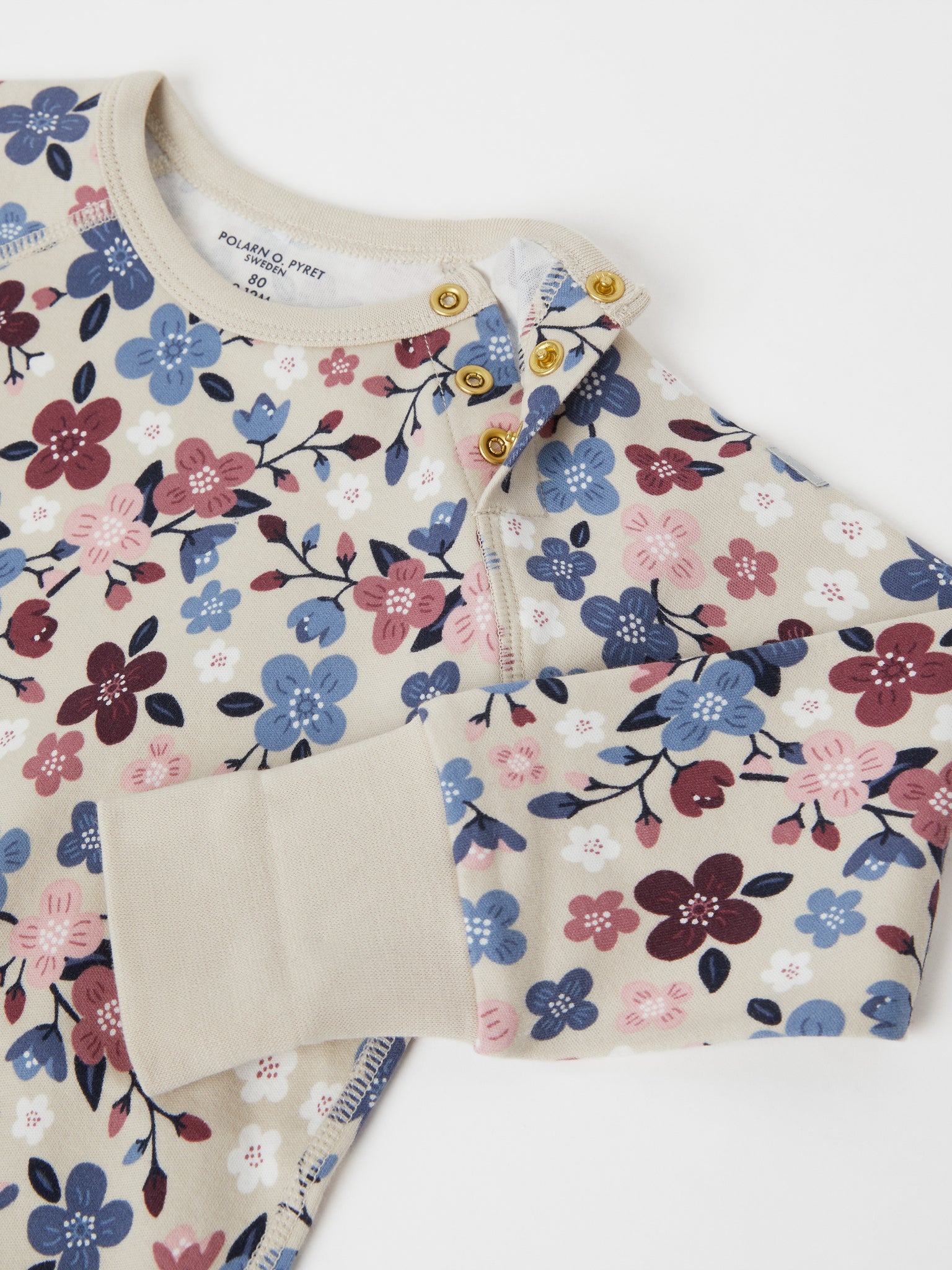 Organic Cotton Floral Babygrow from the Polarn O. Pyret baby collection. The best ethical baby clothes