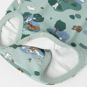 Green Organic Cotton Babygrow from the Polarn O. Pyret baby collection. Nordic baby clothes made from sustainable sources.