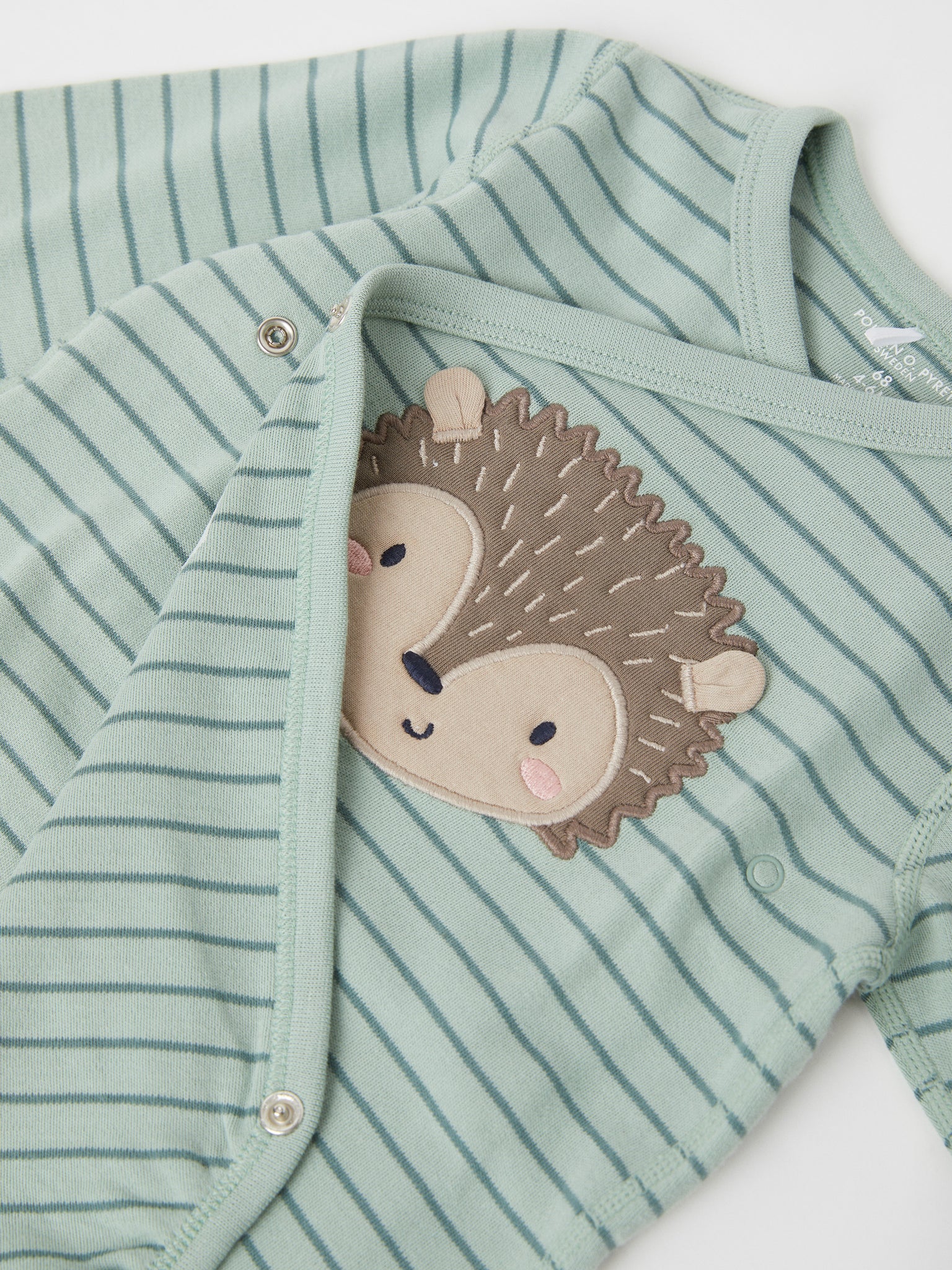Hedgehog Print Wraparound Babygrow from the Polarn O. Pyret baby collection. Made using 100% GOTS Organic Cotton
