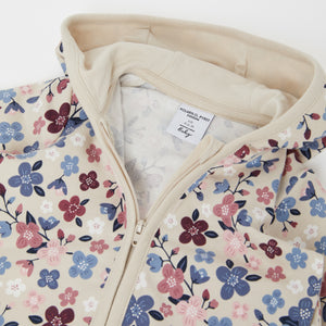 Organic Cotton Floral Baby All-In-One from the Polarn O. Pyret baby collection. Nordic baby clothes made from sustainable sources.