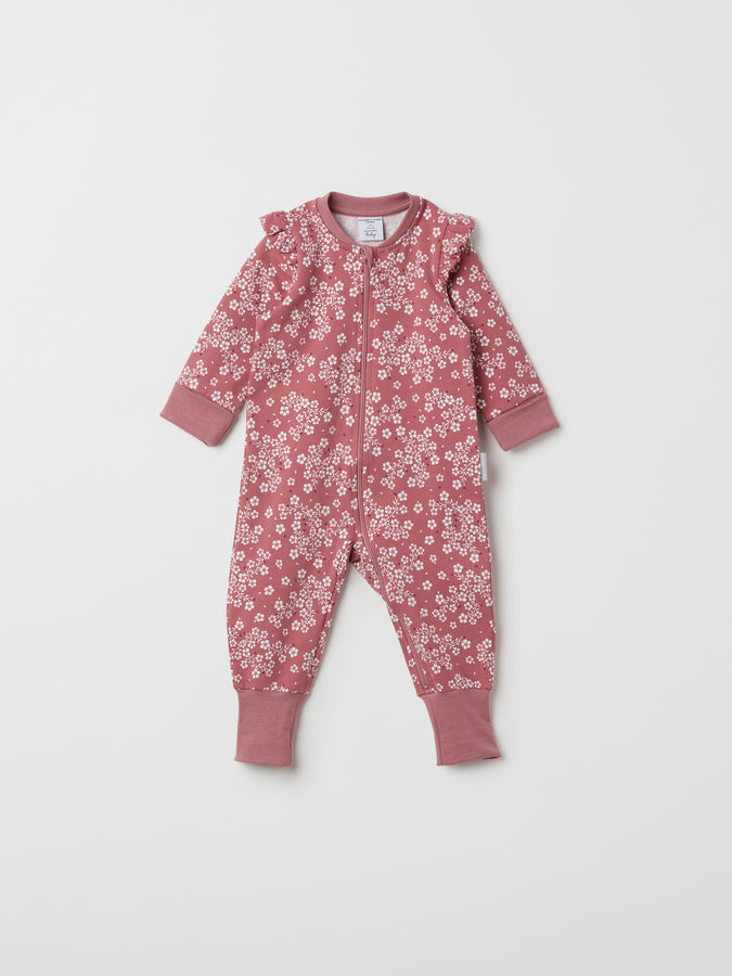 Organic Cotton Floral Pink Baby Romper from the Polarn O. Pyret baby collection. Nordic baby clothes made from sustainable sources.