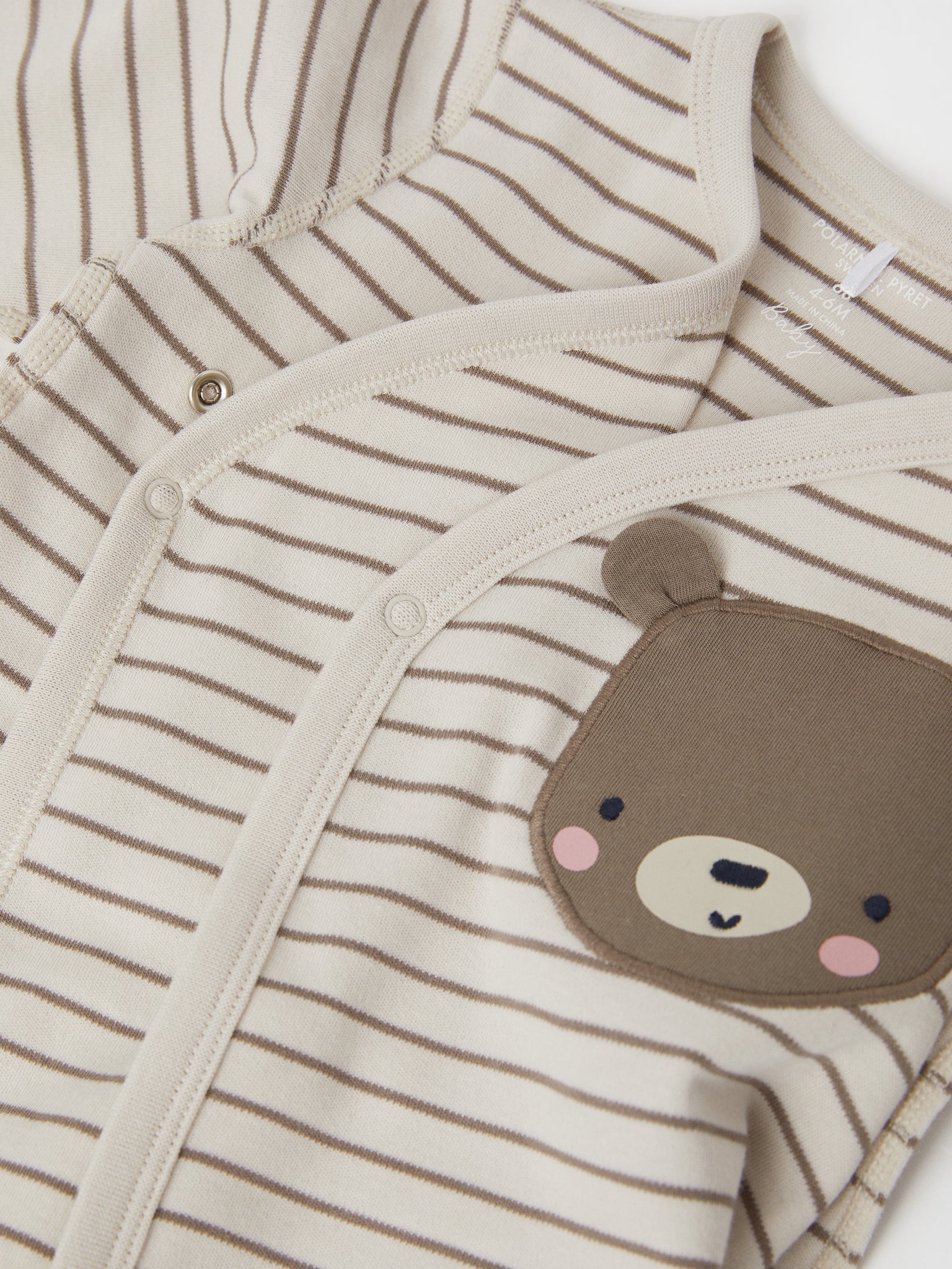 Bear Print Beige Wraparound Babygrow from the Polarn O. Pyret baby collection. The best ethical baby clothes