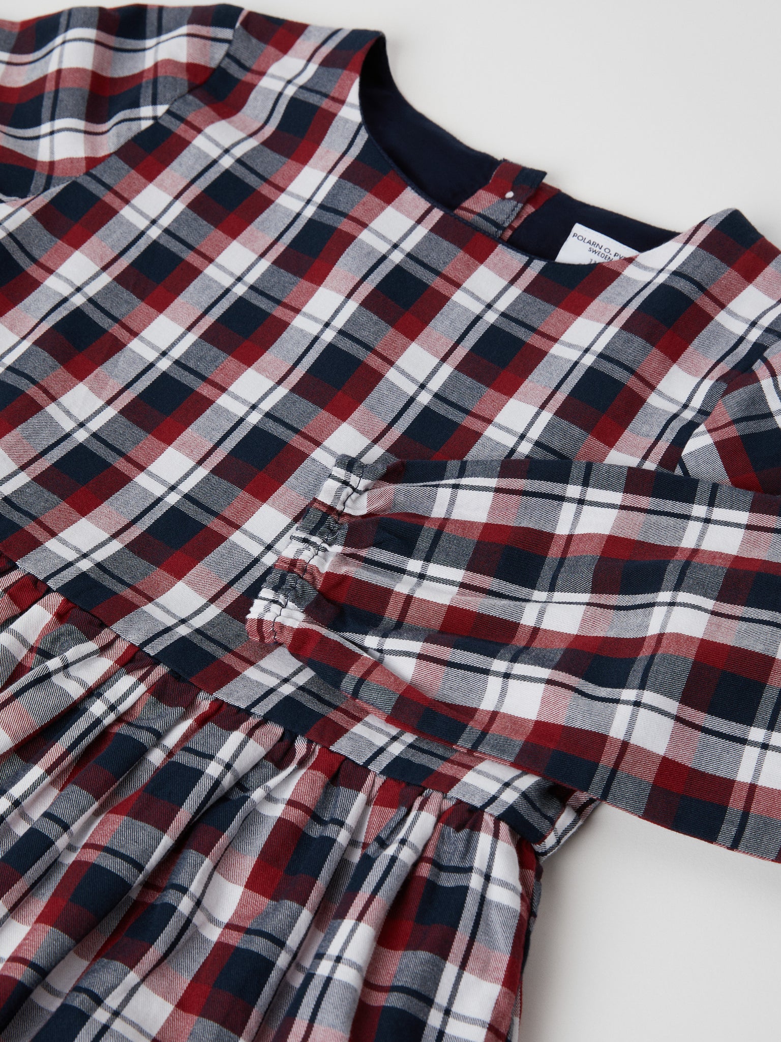 Checked Organic Cotton Kids Dress from the Polarn O. Pyret kidswear collection. Ethically produced kids clothing.