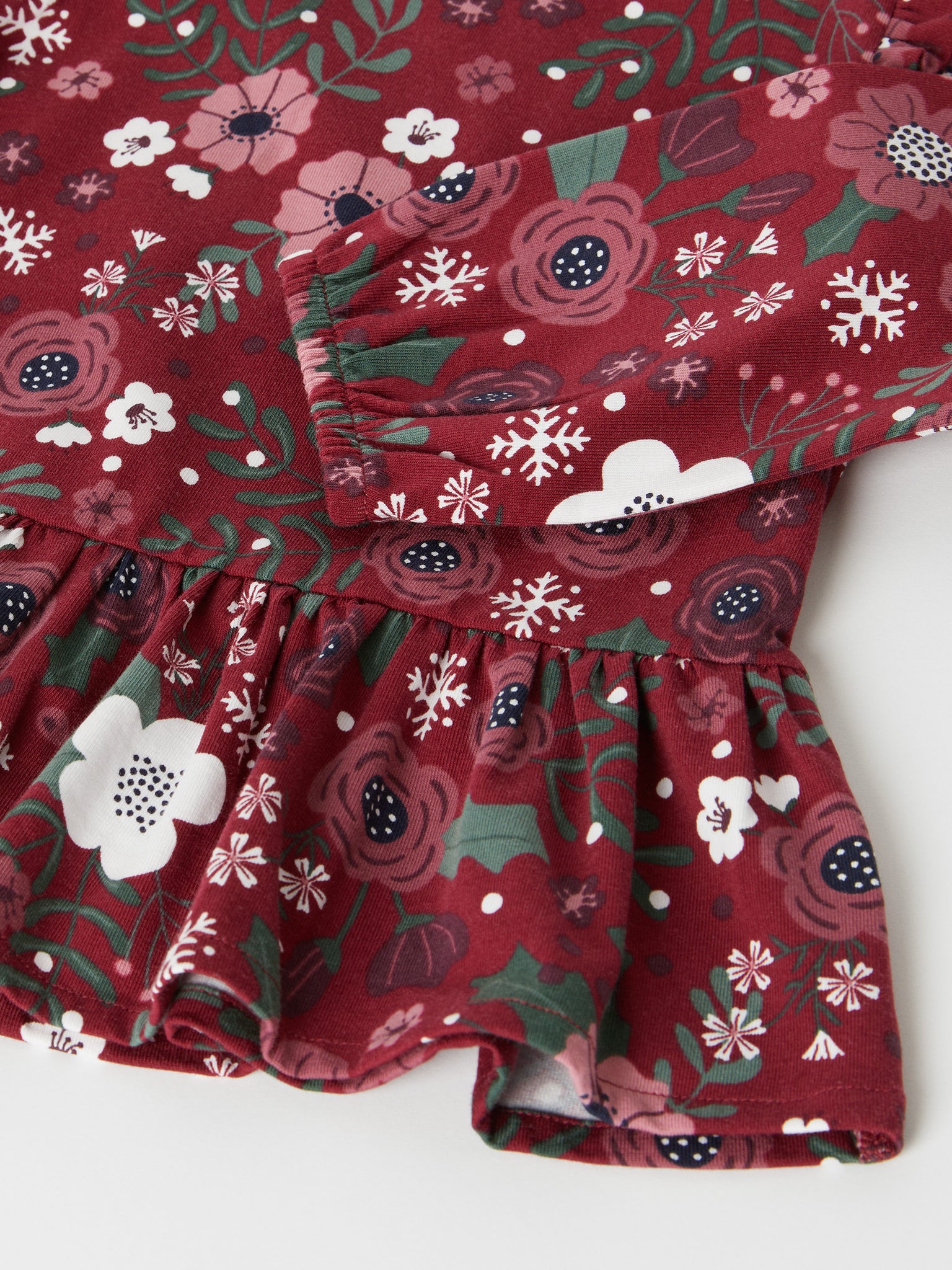 Red Floral Print Baby Top from the Polarn O. Pyret baby collection. Nordic baby clothes made from sustainable sources.