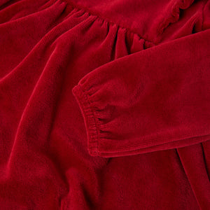 Red Velour Baby Dress from the Polarn O. Pyret baby collection. Nordic baby clothes made from sustainable sources.
