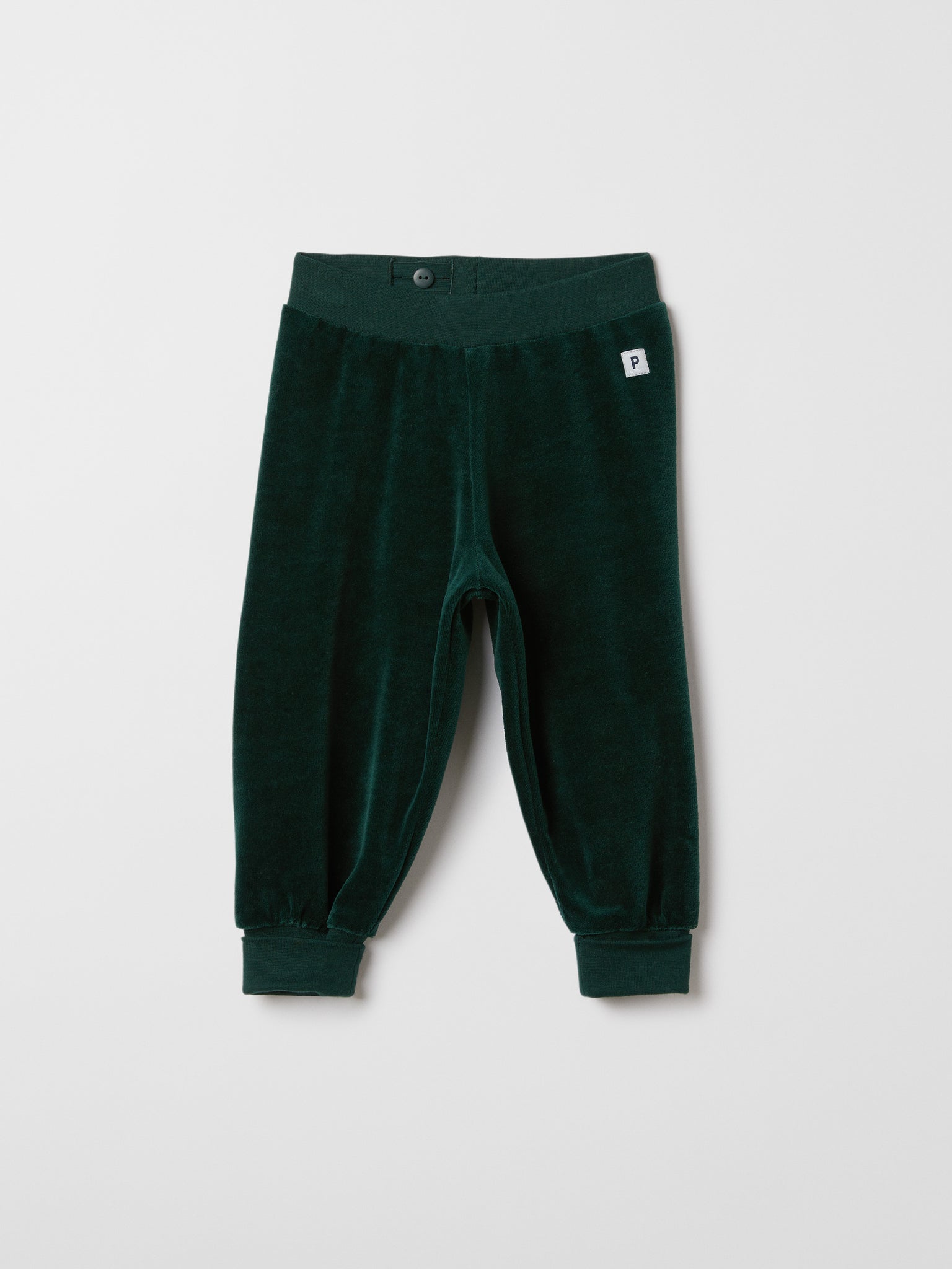 Green Velour Baby Trousers from the Polarn O. Pyret baby collection. Nordic baby clothes made from sustainable sources.