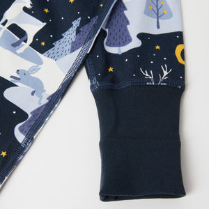 Winter Forest Cotton Baby Sleepsuit from the Polarn O. Pyret baby collection. Nordic baby clothes made from sustainable sources.