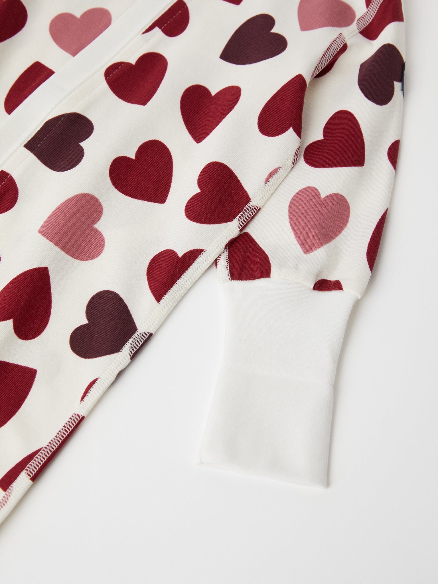Heart Print Cotton Baby Sleepsuit from the Polarn O. Pyret baby collection. The best ethical baby clothes