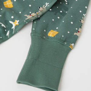 Christmas Print Cotton Baby Sleepsuit from the Polarn O. Pyret baby collection. The best ethical baby clothes
