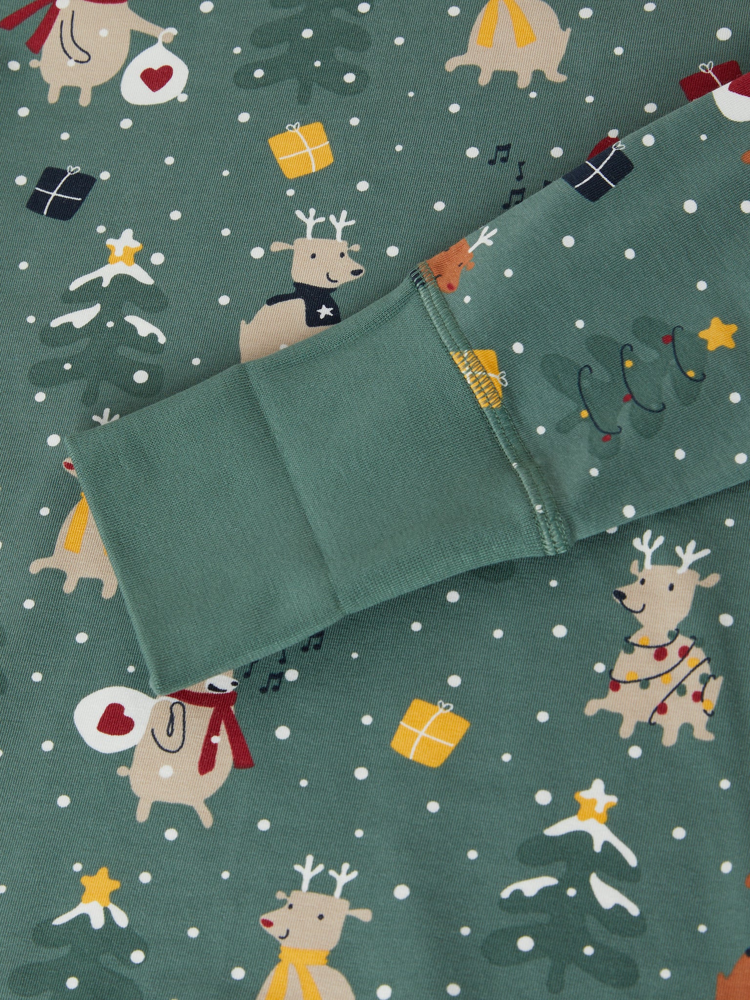 Green Organic Kids Christmas Pyjamas from the Polarn O. Pyret kidswear collection. The best ethical kids clothes
