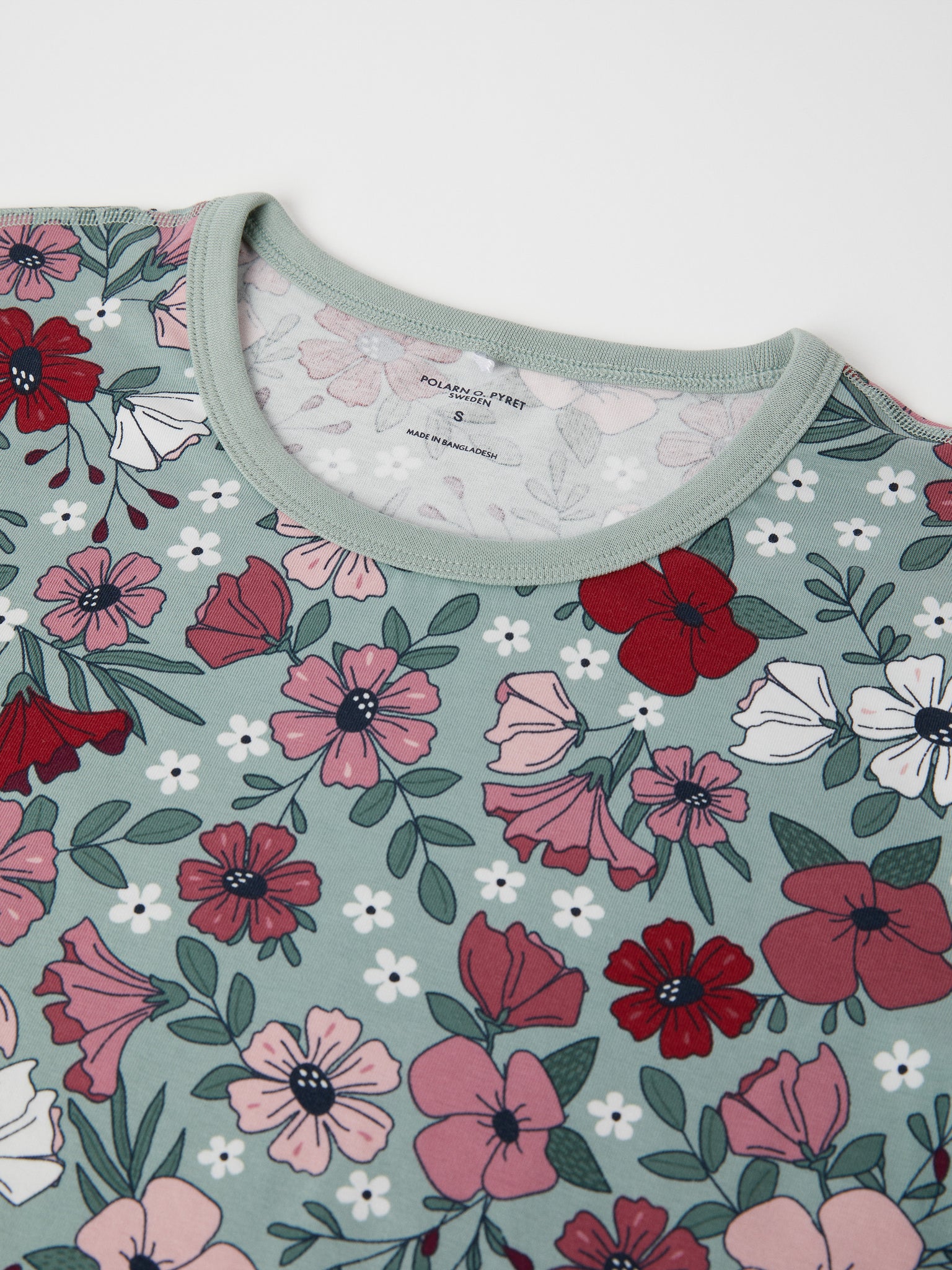 Floral Print Adult Pyjamas from the Polarn O. Pyret adult collection. Clothes made using sustainably sourced materials.