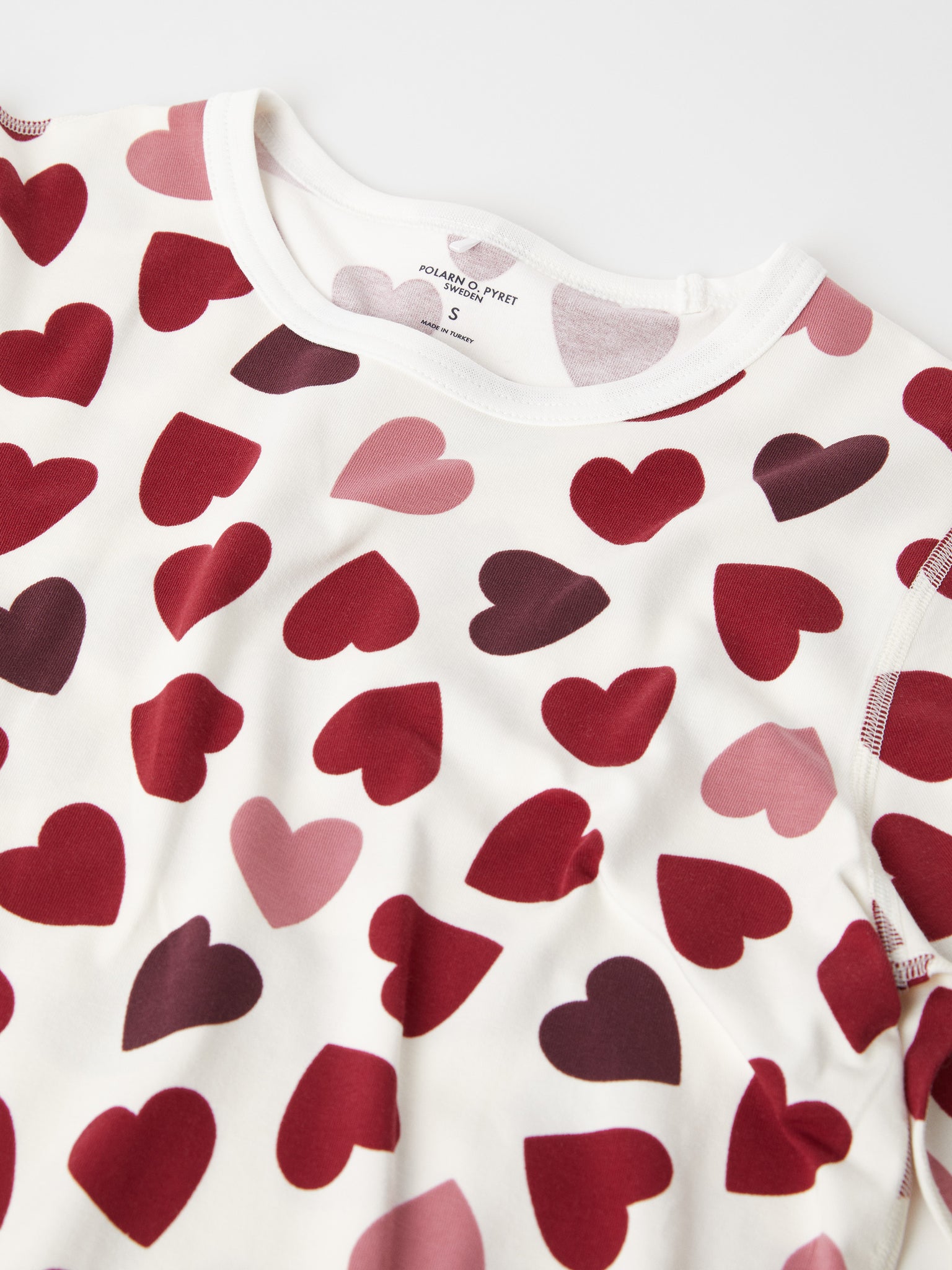 Heart Print Adult Pyjamas from the Polarn O. Pyret adult collection. Clothes made using sustainably sourced materials.