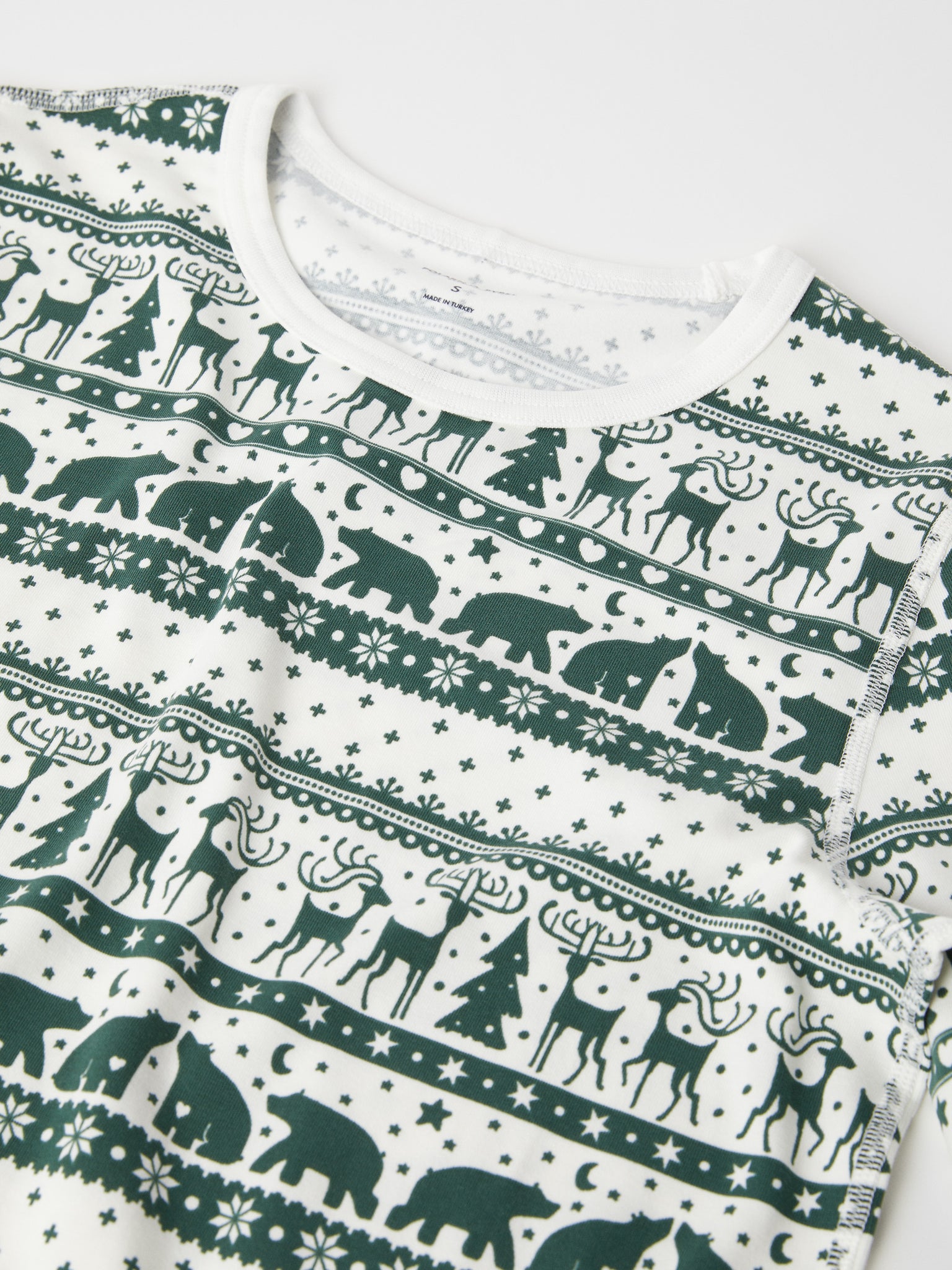 Christmas Print Cotton Adult Pyjamas from the Polarn O. Pyret adult collection. Clothes made using sustainably sourced materials.