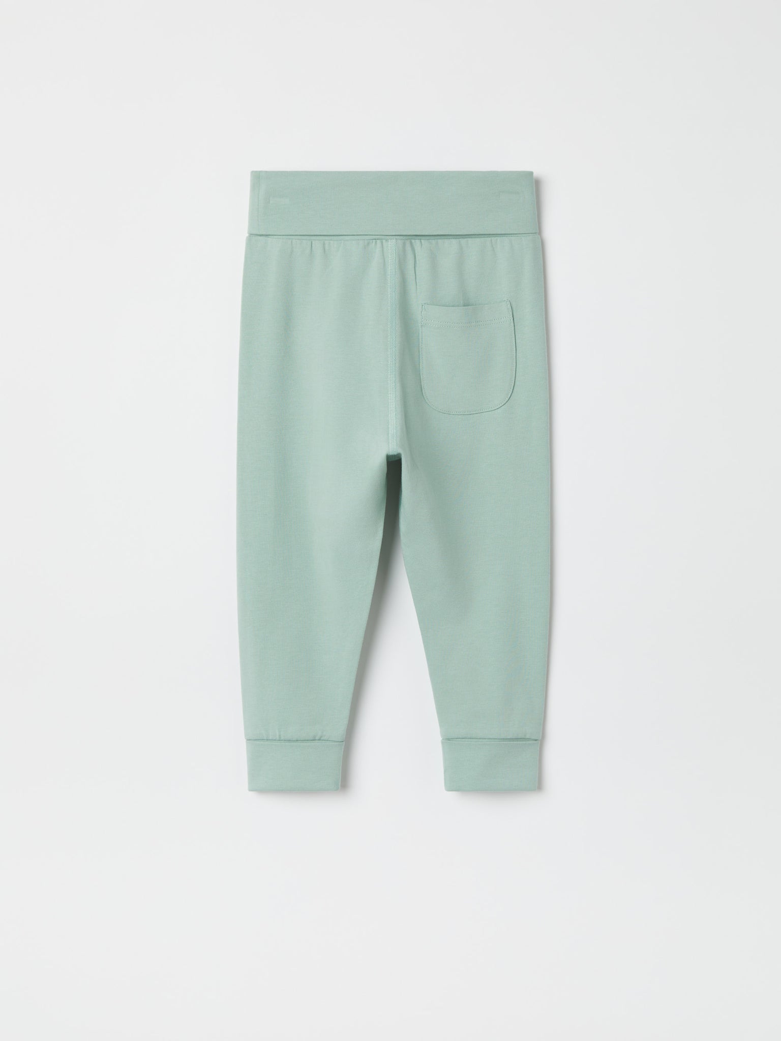 Green Organic Cotton Baby Leggings from the Polarn O. Pyret baby collection. Nordic kids clothes made from sustainable sources.
