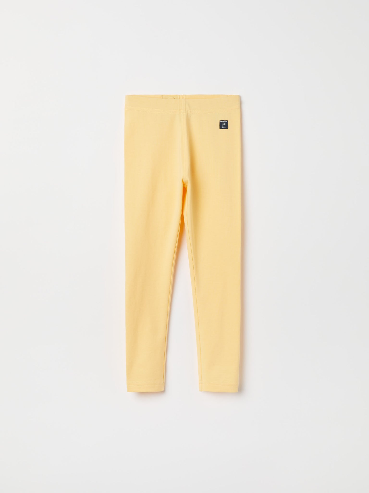 Yellow Kids Leggings from the Polarn O. Pyret kidswear collection. Nordic kids clothes made from sustainable sources.