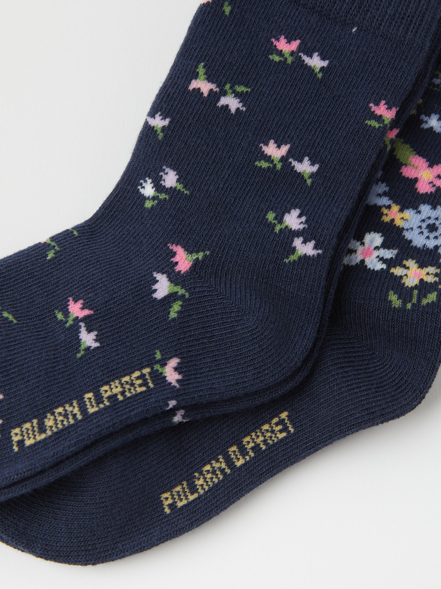 Two Pack Floral Kids Socks from the Polarn O. Pyret kidswear collection. Ethically produced kids clothing.