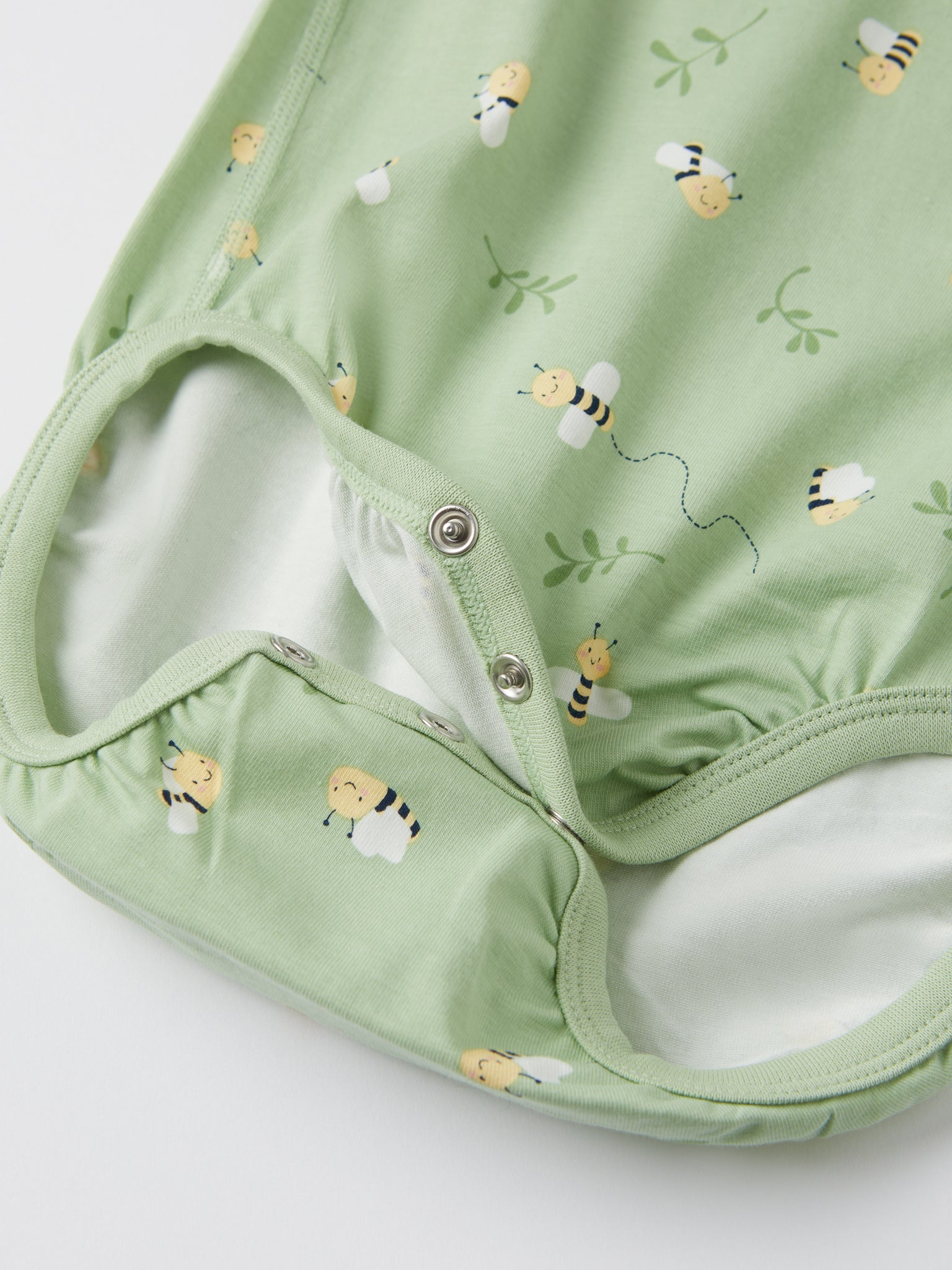 Bee Print Babygrow from the Polarn O. Pyret baby collection. Clothes made using sustainably sourced materials.