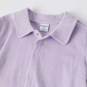 Purple Organic Cotton Kids Polo Shirt from the Polarn O. Pyret kidswear collection. Nordic kids clothes made from sustainable sources.