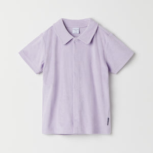 Purple Organic Cotton Kids Polo Shirt from the Polarn O. Pyret kidswear collection. Nordic kids clothes made from sustainable sources.