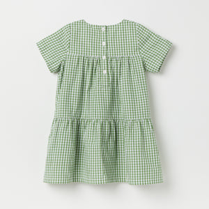 Green Gingham Check Kids Dress from the Polarn O. Pyret kidswear collection. Nordic kids clothes made from sustainable sources.