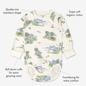 GOTS organic cotton long sleeve babygrow in a unisex bunny print with text labels shown on the sides