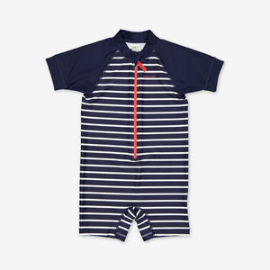 UPF 50 navy blue striped short sleeve kids swimsuit with a front zipper that has a chin guard that is gentle against the chin and cheeks.