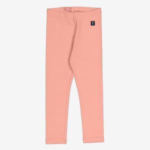 Kids leggings in pink made from organic cotton that has an adjustable waist so they always fit perfectly.