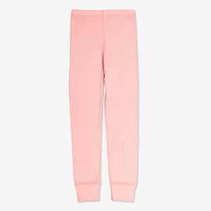 Back of thermal long johns in the colour pink for 0-12 year olds. Made with merino cosy merino wool