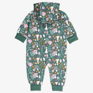 Back view of newborn baby onsie with Woodland print of flowers and bunnies in GOTS organic cotton. With cosy lined hood and full-length zip for speedy dressing and foldable ribbed cuffs for growing room