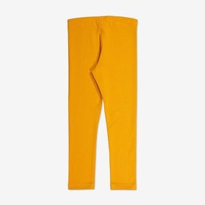  Organic Cotton Yellow Kids Leggings from Polarn O. Pyret Kidswear. Made from sustainable materials.